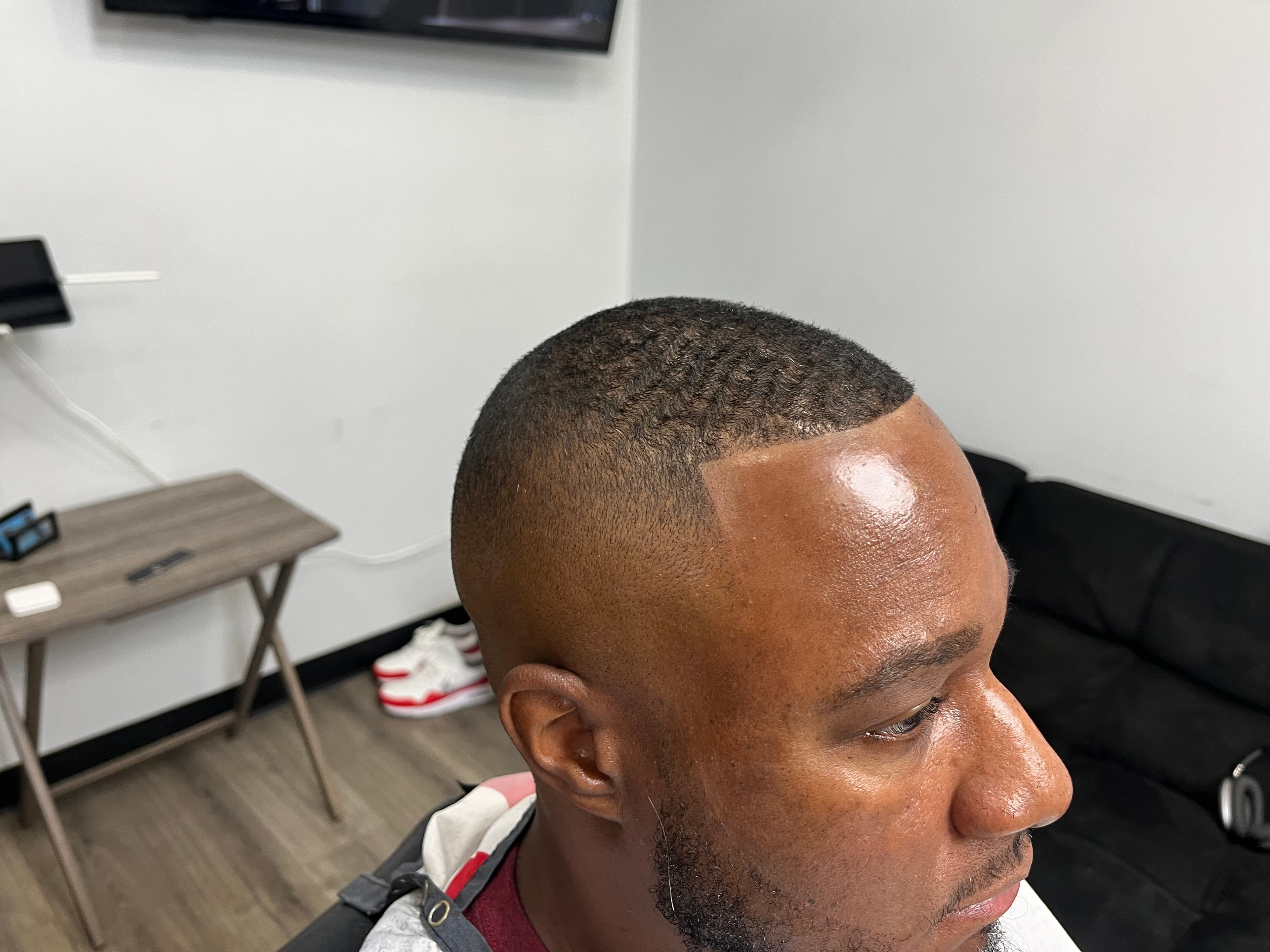 Clean fade with waves haircut at Garland Cuts barber Suwanee GA